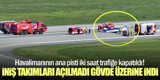İniş takımları açılmayan uçak gövde üzerine indi!