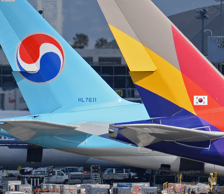 Korean Air, Asiana Airlines'ı kanatlarının altına aldı